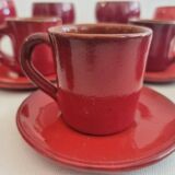 Red enamelled terracotta: cups, saucers, glasses
