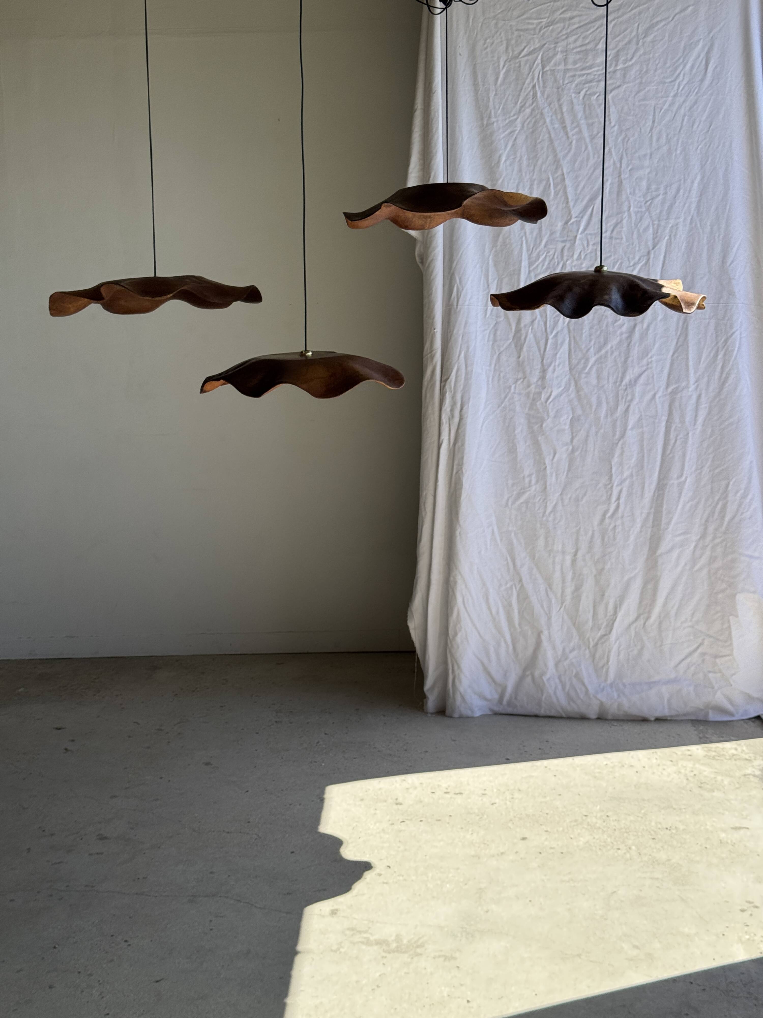 Very large wavy flat leaf suspension in smooth teak D:60