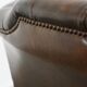 Fauteuil Chesterfield en cuir de vache marron de style anglais