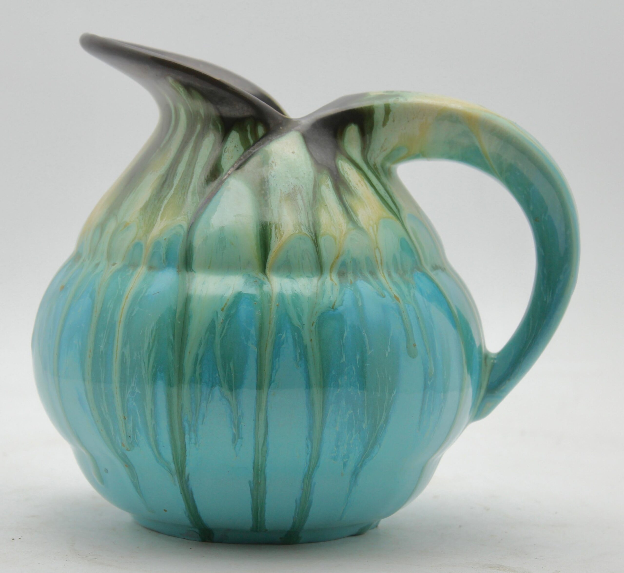 Ceramic pitcher glaze drop light blue, signed belgium