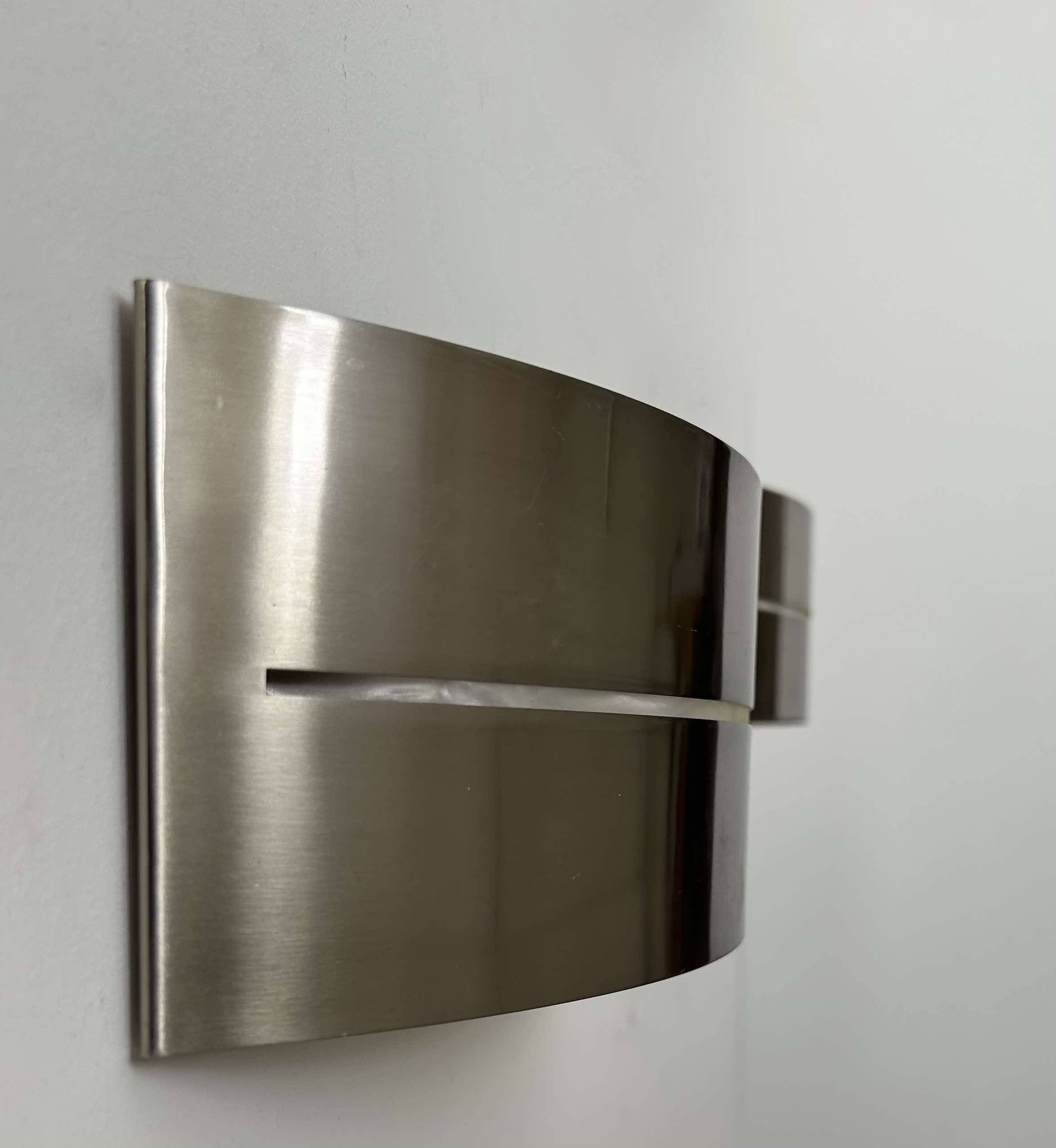 Pair of vintage wall lights, brushed metal, France 1980.