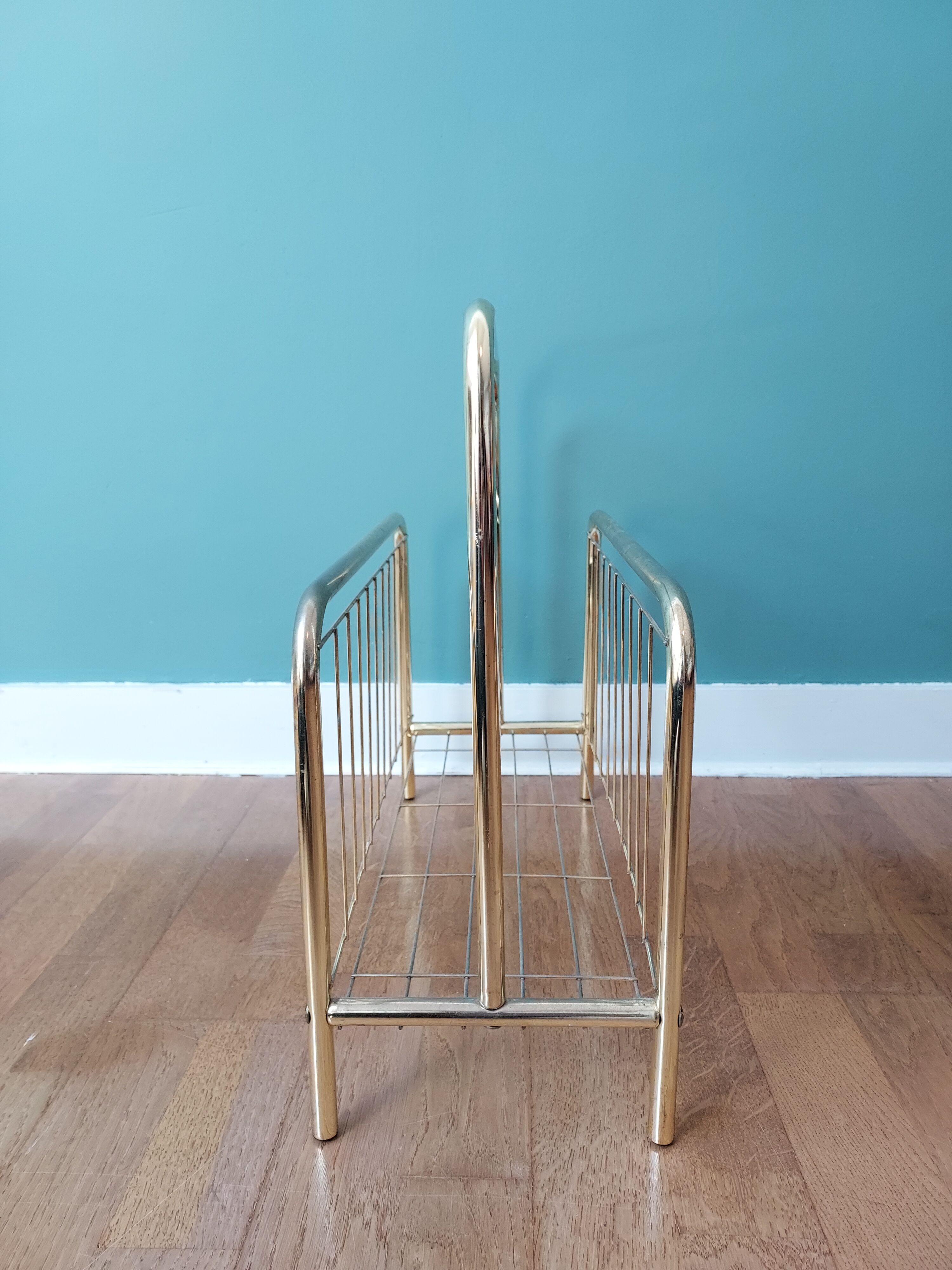 Gilded metal magazine door