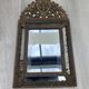 Small mirror with brass parcloses in repoussé style Louis XIV, late 19th century.
