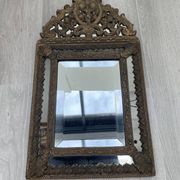 Small mirror with brass parcloses in repoussé style Louis XIV, late 19th century.