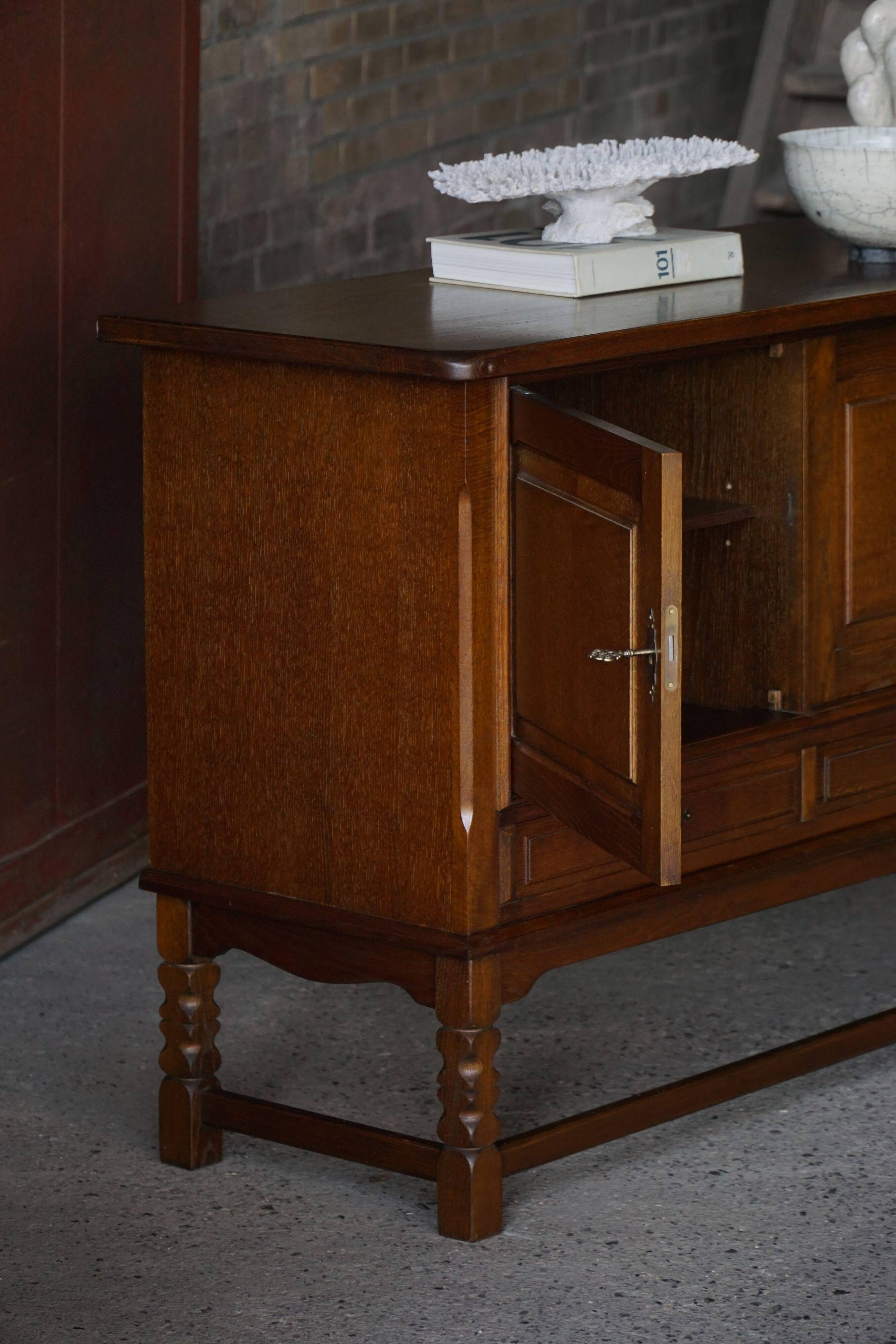 Danish enfilade from the mid-modern century in dark stained oak, 1960s.