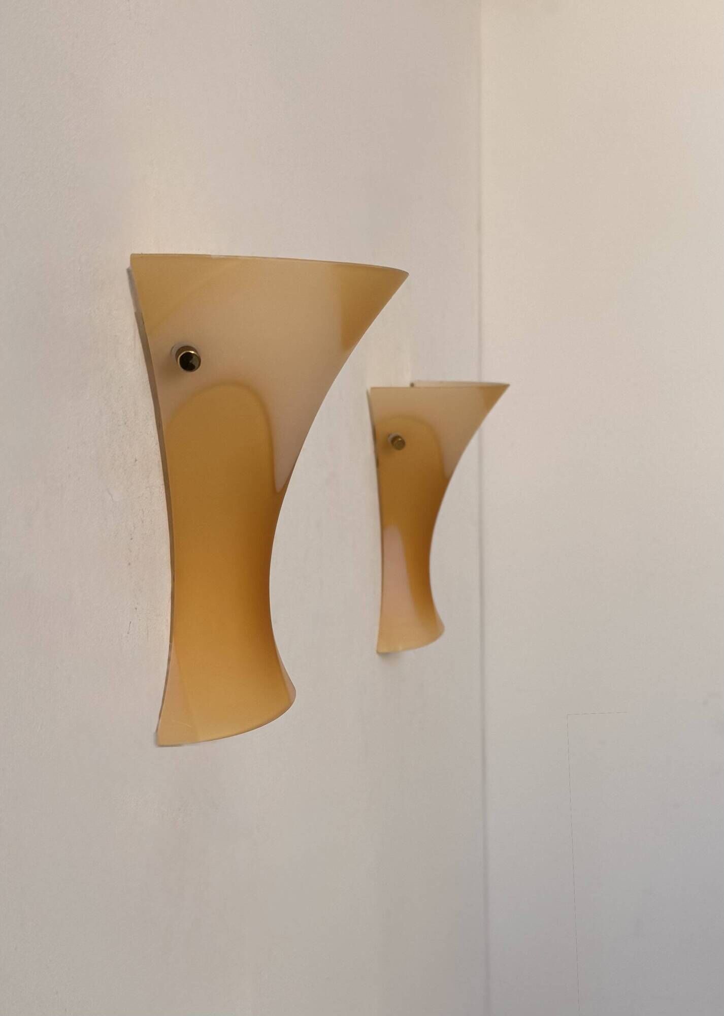 Pair of vintage wall lights with orange glass and brass, Italy 1980.