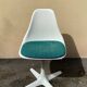 Swivel tulip chair by Maurice Burke.