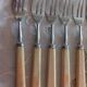 10 dessert forks .old