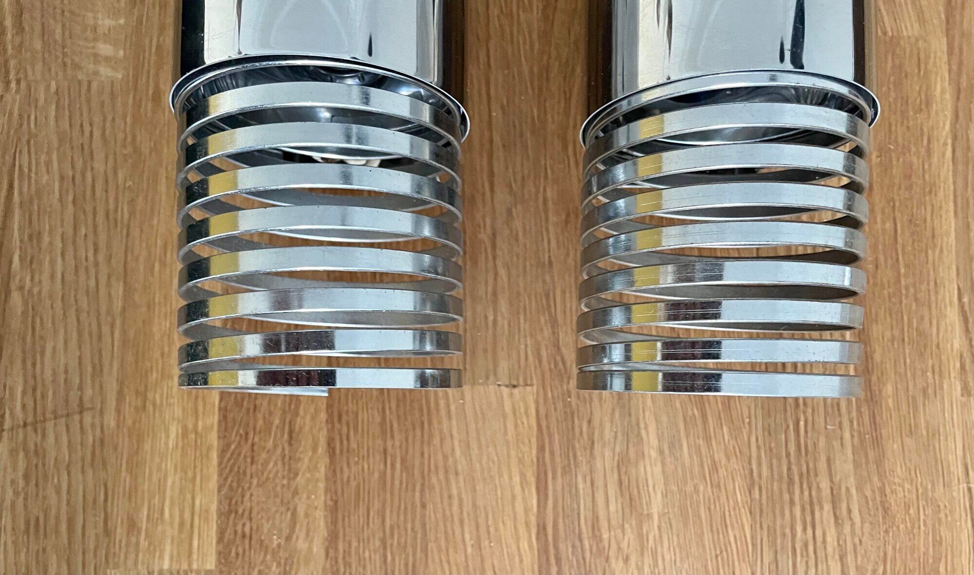 Pair of vintage wall lamps "Spring", chromed metal, France 1970