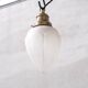 Pair of opaque glass and brass french opaline pendants