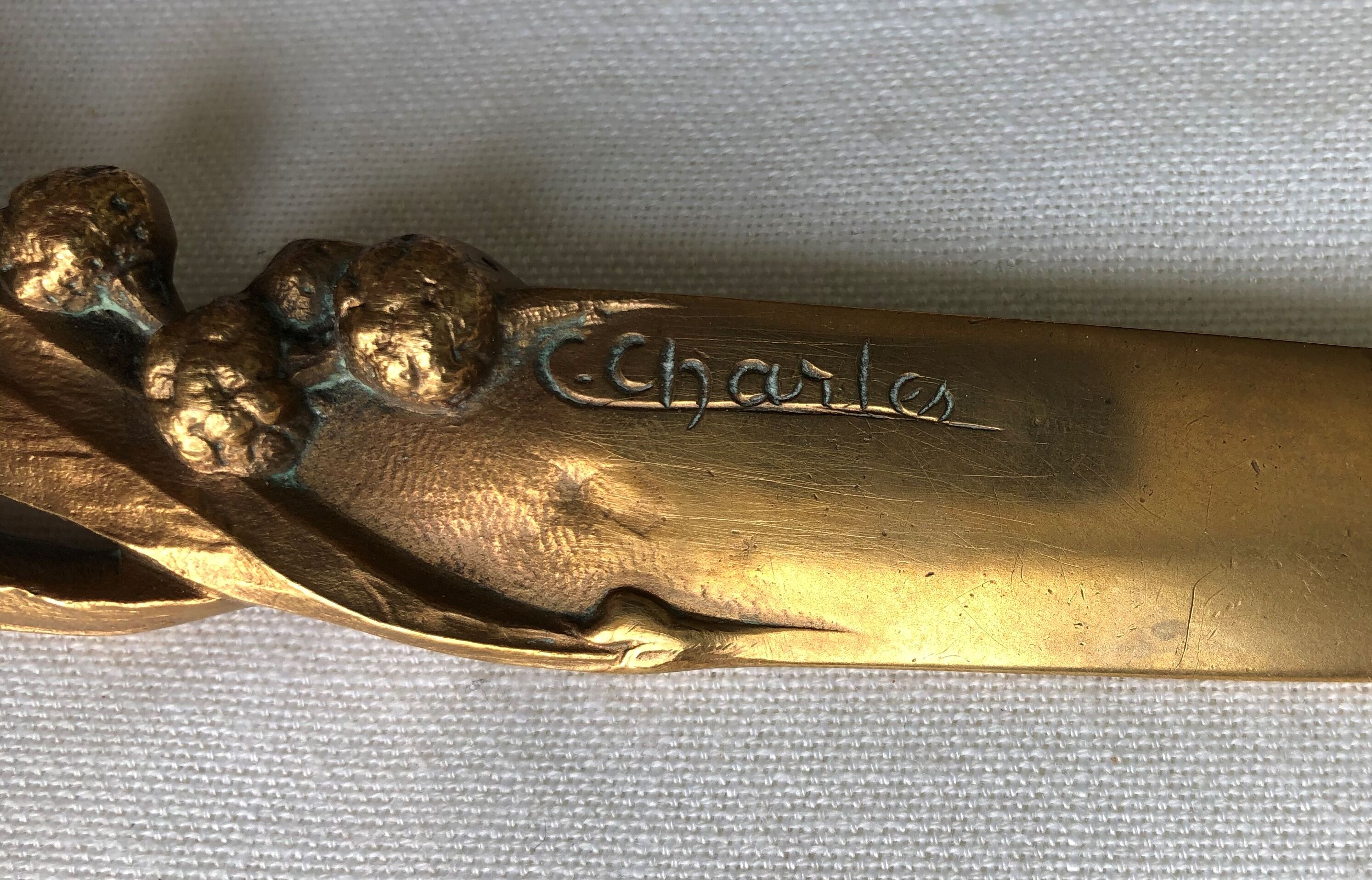 Opens letters cut bronze paper signed