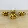 4 golden brass candle holders
