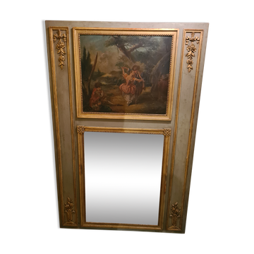 Lacquered wooden trumeau in the Louis XVI style, late 19th century.