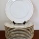 Set of 12 flat plates made of Limoges porcelain