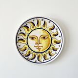 Decorative ceramic plate with sun face