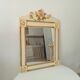 Vintage bohemian mirror from the 80s in carved wood.