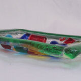 Empty millefiori-style glass pocket