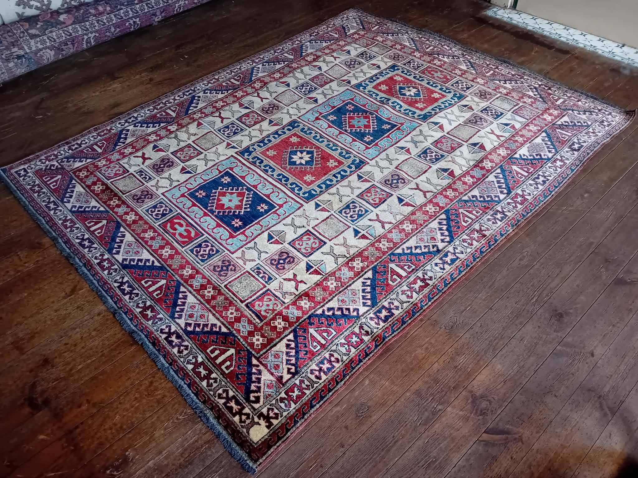 Handmade Pakistani Kazak rug 235x184cm