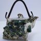 Vintage enamelled earthenware shell decor teapot