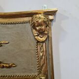 Mirror patinated golden and gray trumeau