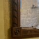Carved wooden mirror in Louis XVI style