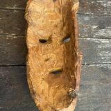 Moroccan mask in carved wood vintage decoration