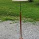 Vintage tripod floor lamp from the 60s in wood and brass