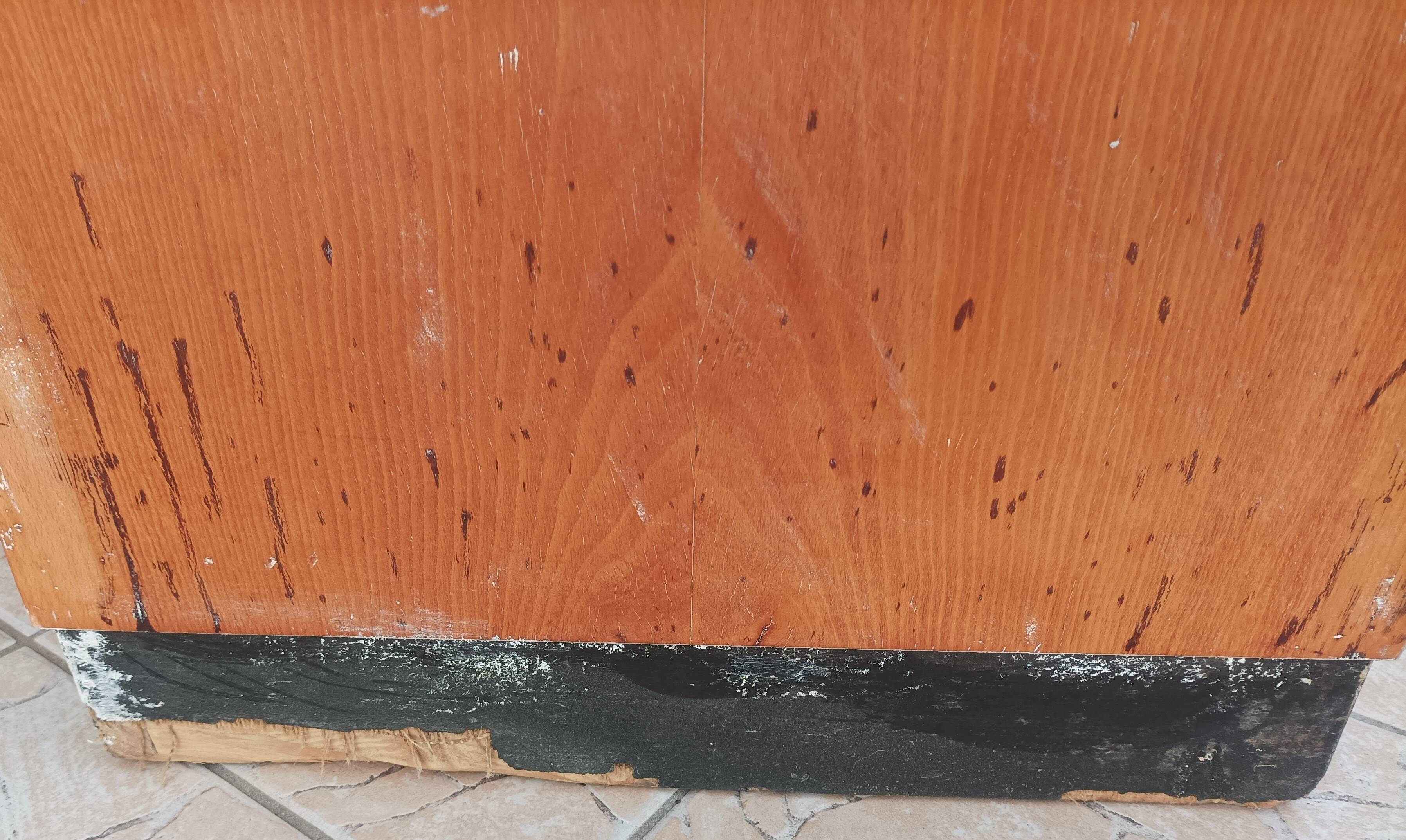 Workshop furniture with drawers and curtain in beech and walnut.