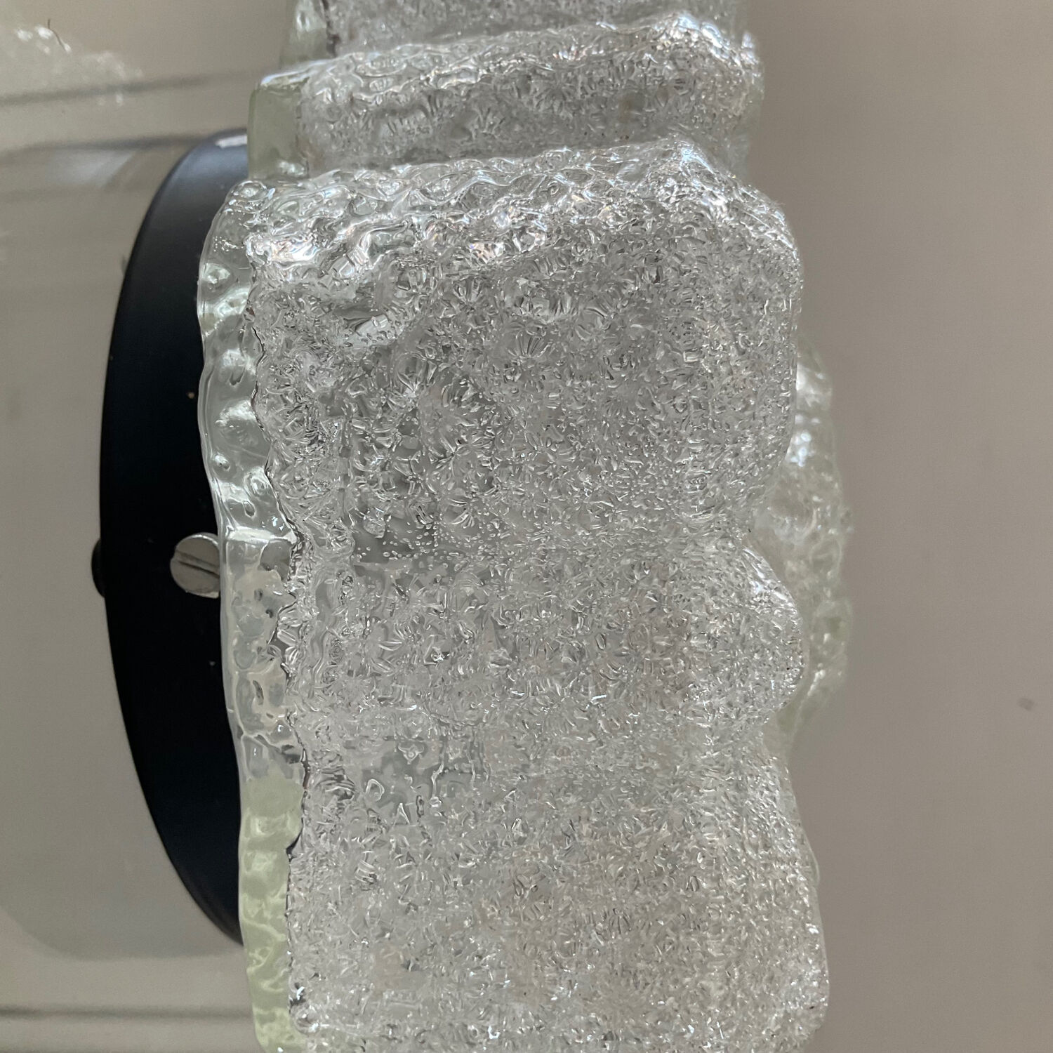 Molded glass wall lamp from the 70s