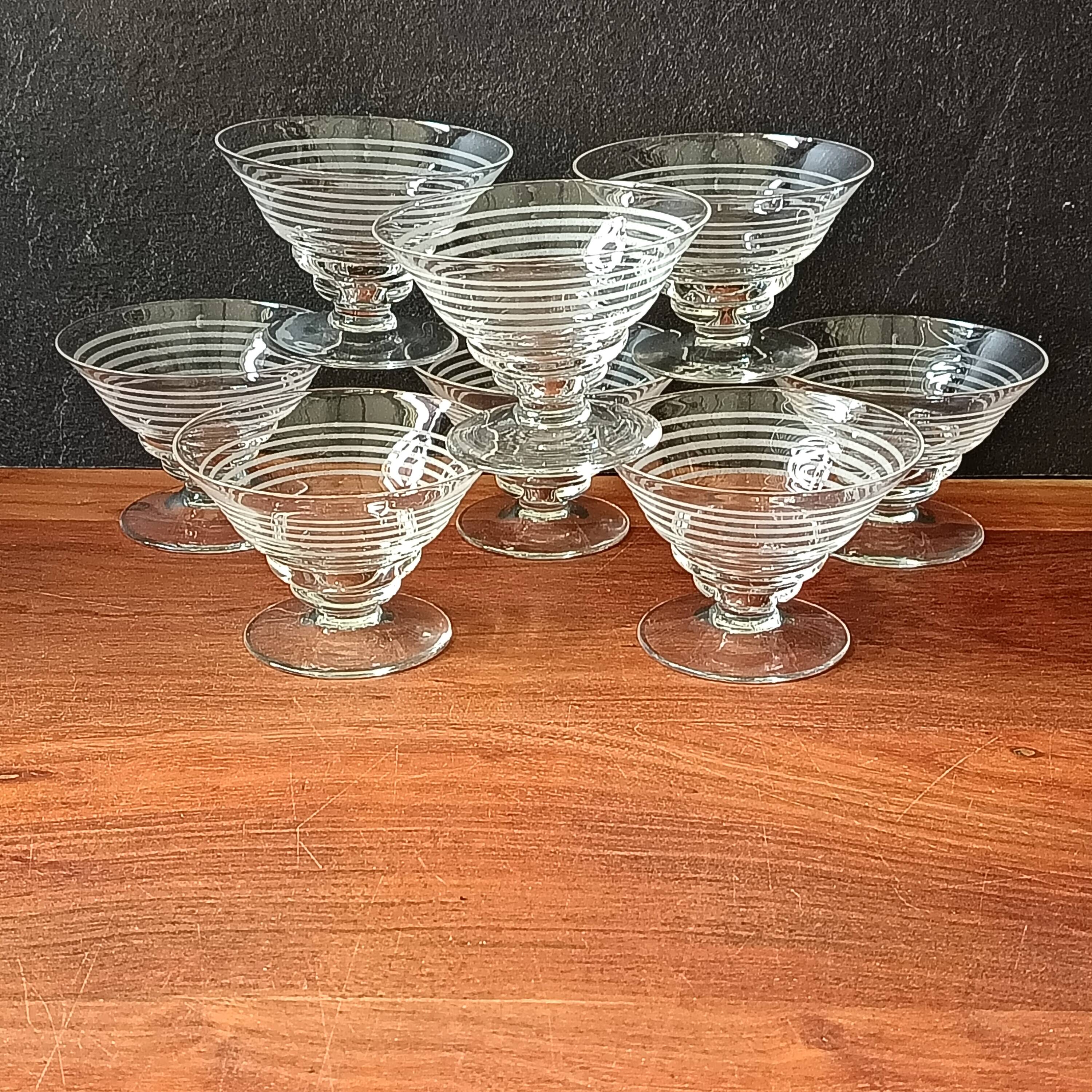 8 conical glasses with a vintage 1950s line pattern.