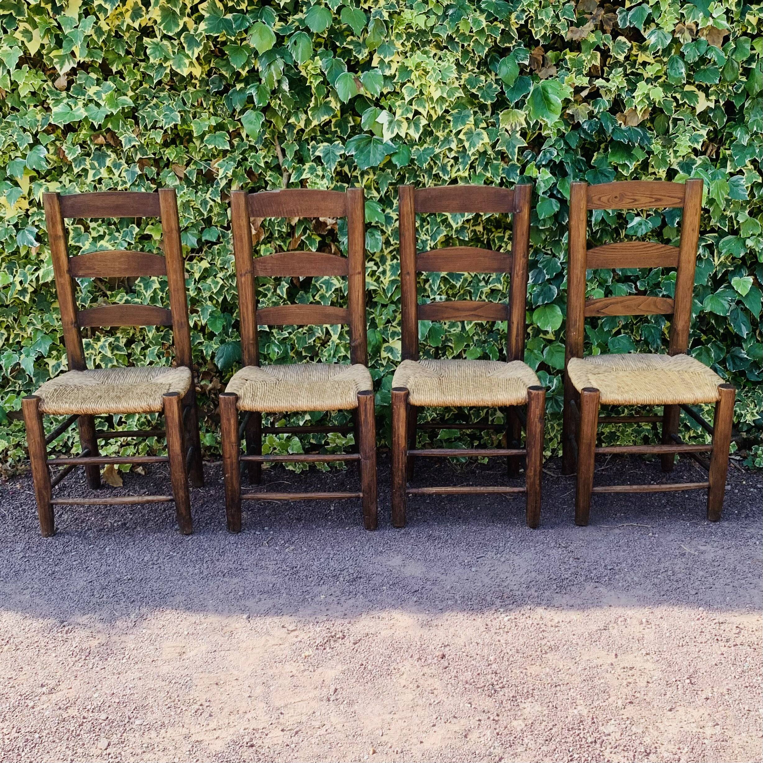Set of 4 handcrafted rush chairs in solid oak.