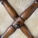 Wall-mounted accordion coat rack made of turned wood