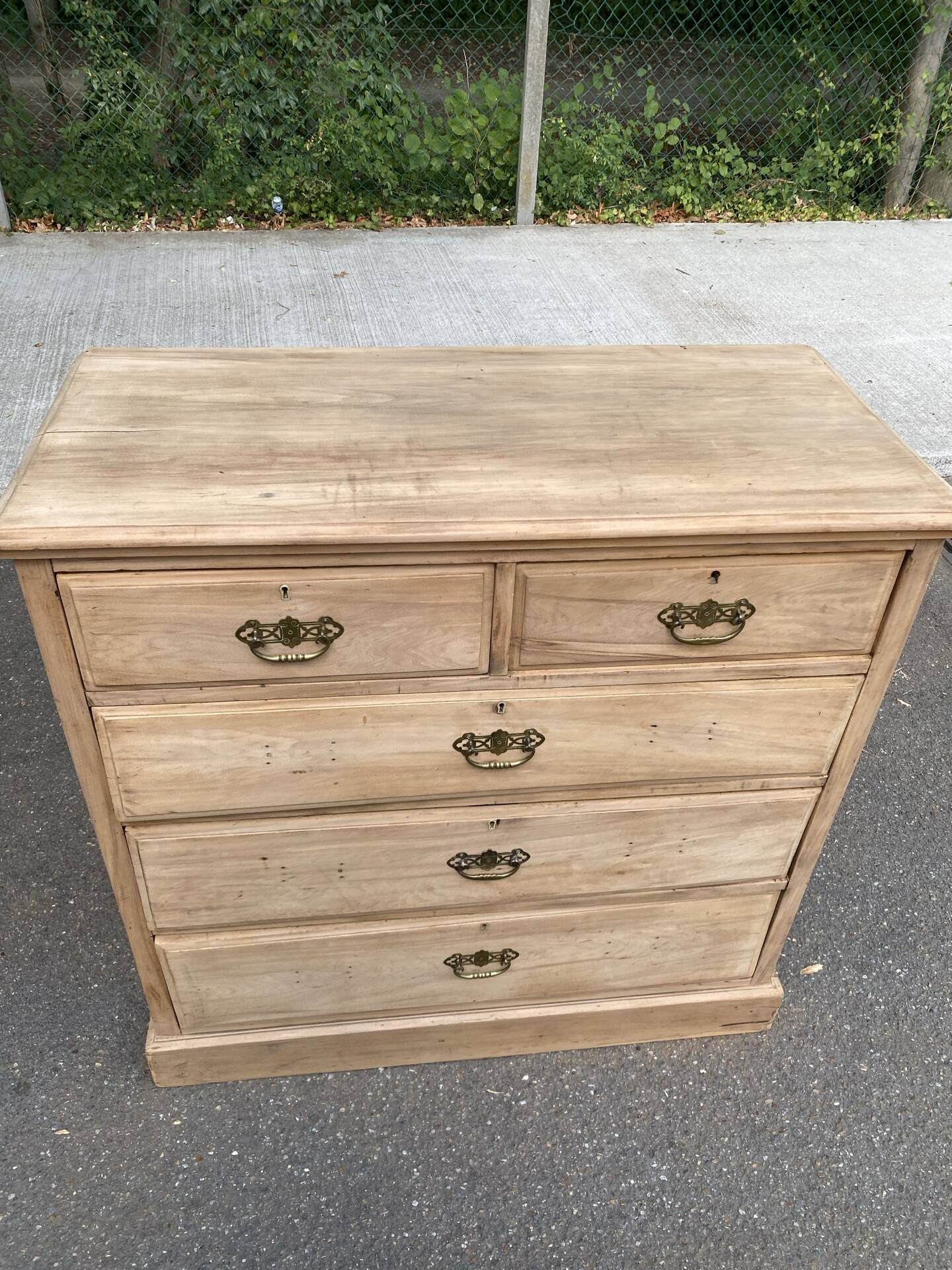 English stripped commode made of solid raw wood from the 19th century.