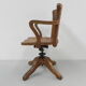 Oak office chair with spring mechanism and armrests