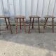 Lot 4 twisted wood tripod stools