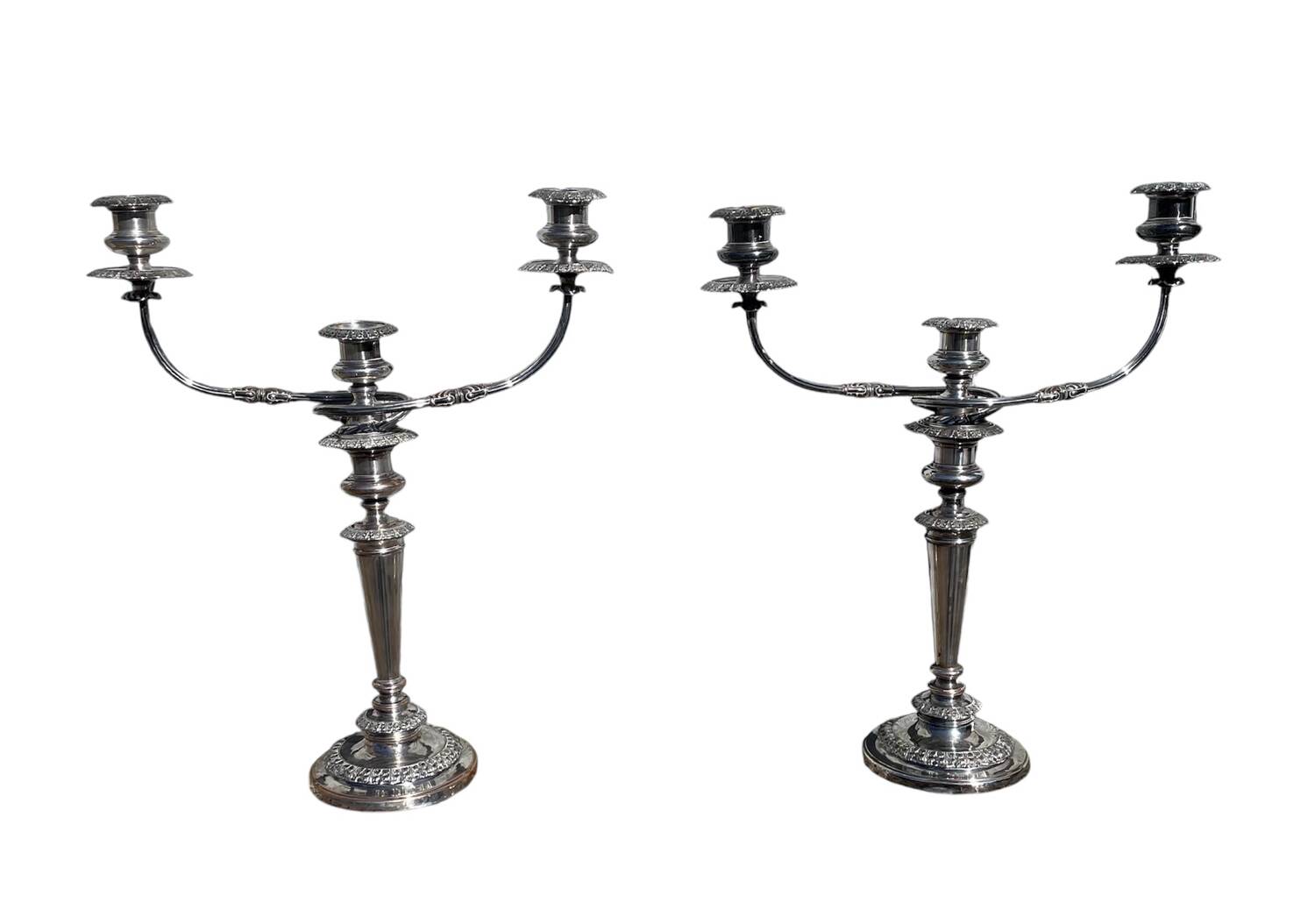 Pair of convertible three-light candelabra in silver-plated metal.