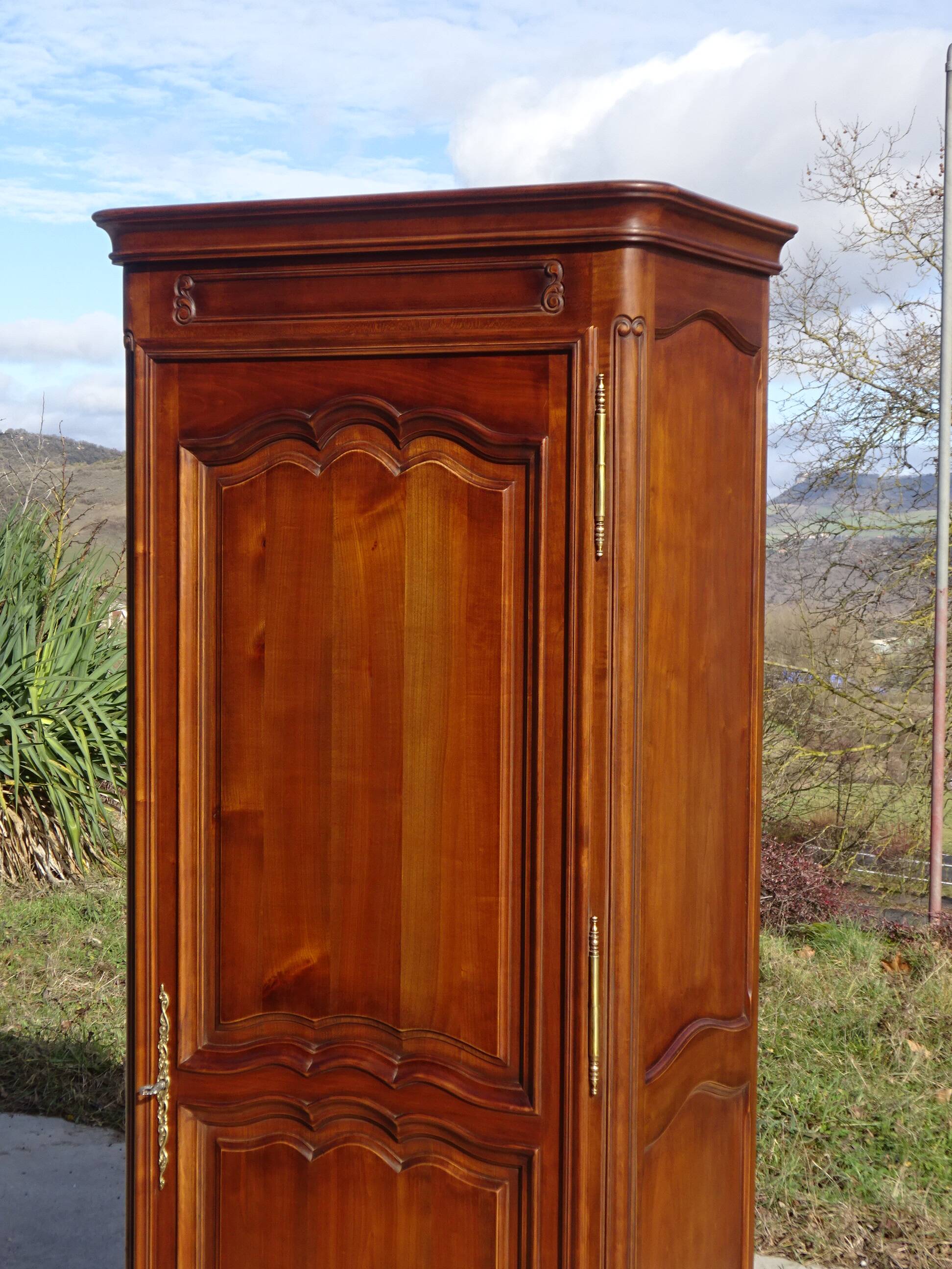 Louis XV style bonnetière in solid cherry wood