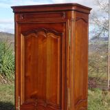 Louis XV style bonnetière in solid cherry wood