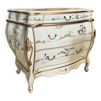 Ivory lacquered Chinese commode with mother-of-pearl inlays of geishas.