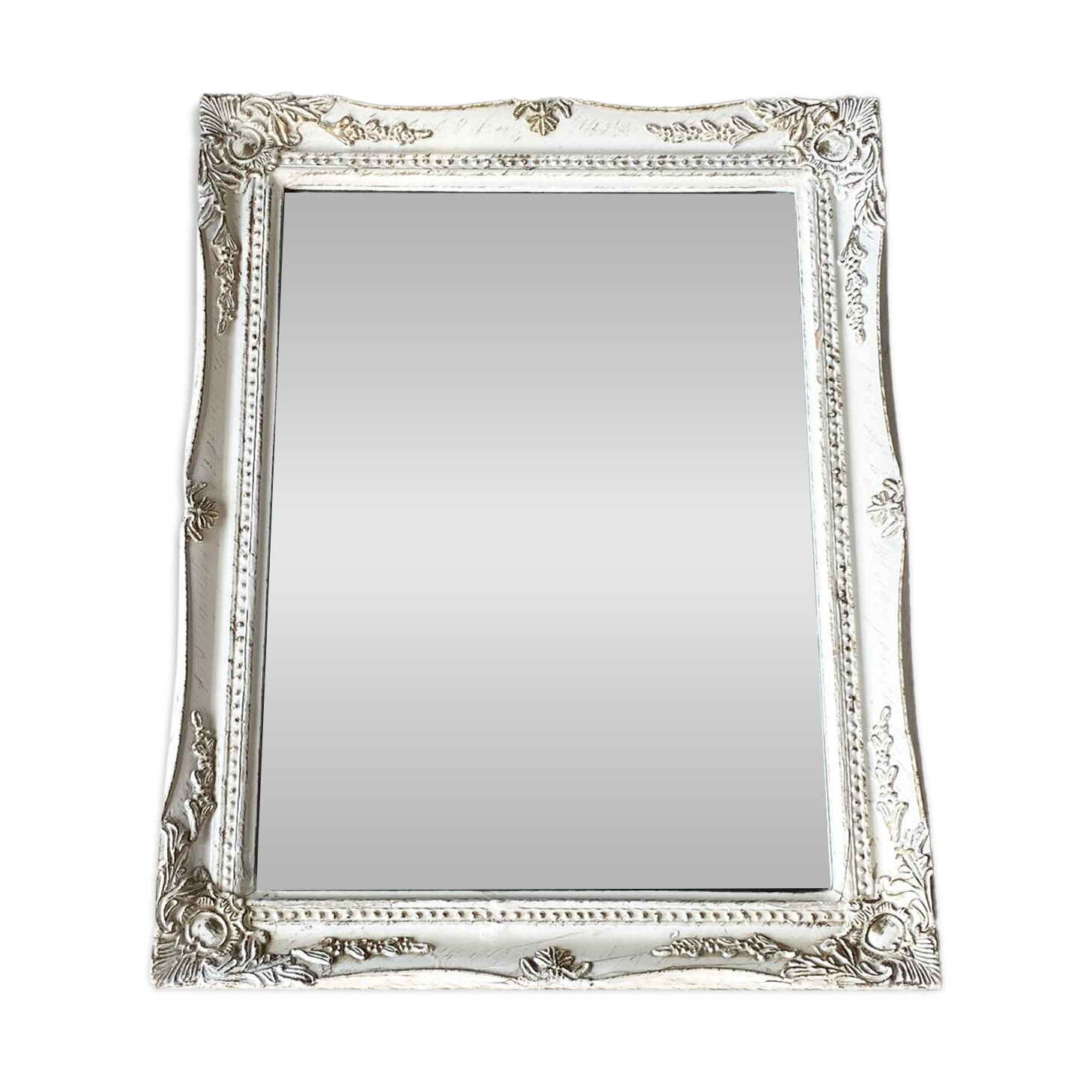 Beveled mirror in carved wood