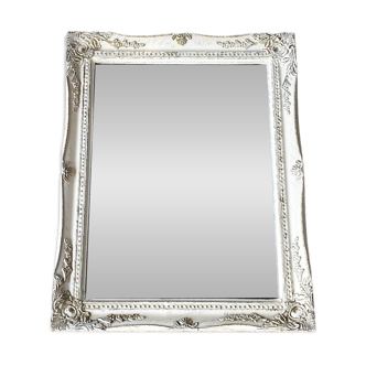 Miroir biseauté en bois sculpté