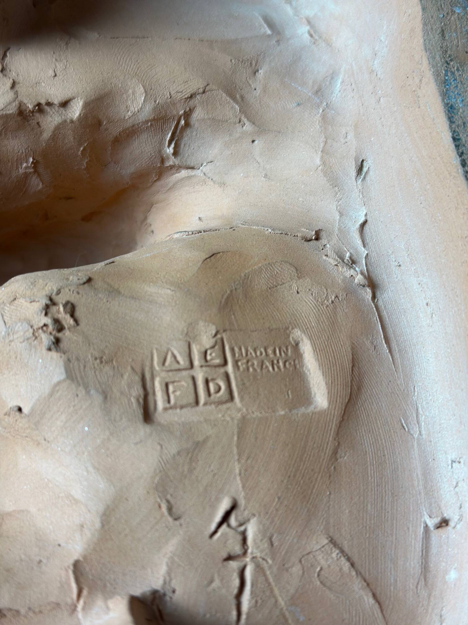 Terracotta dog signed R. Pollin