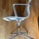 ICF armchair in white leather, four-star base on glides