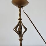 Large "Arts & Crafts" style lamp in beaten iron with a golden patina.