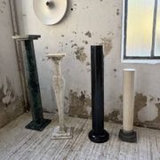 Set of 4 marble columns or pedestals.