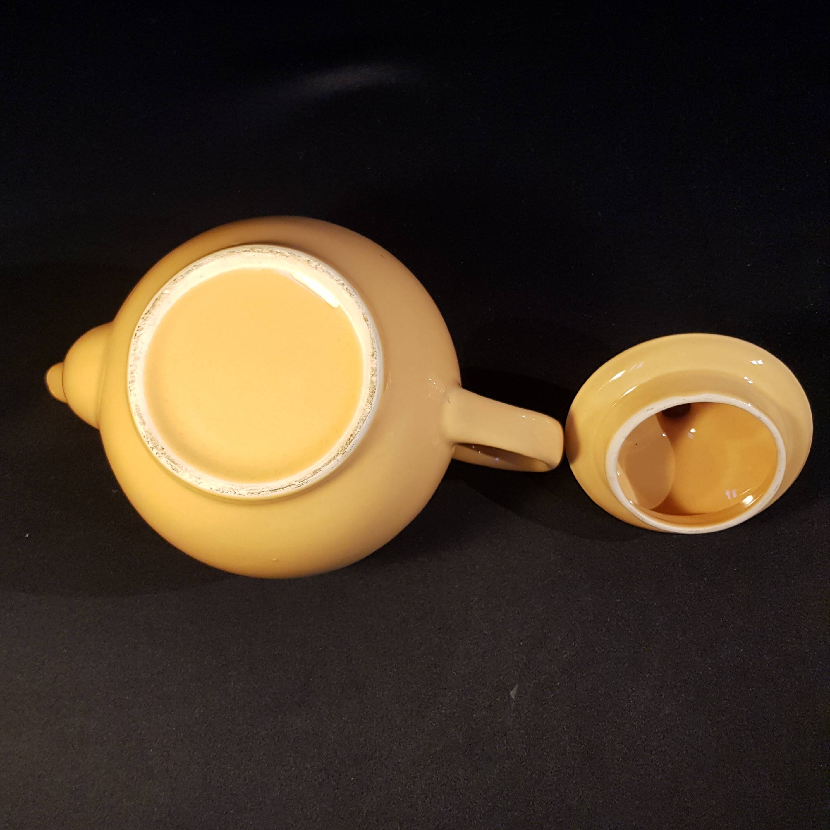 Yellow ceramic teapot