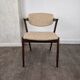 Rosewood and wool chair, model 42 by Kai Kristiansen for Korup Stolefabrik, Denmark, 1956.