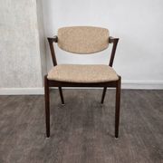 Rosewood and wool chair, model 42 by Kai Kristiansen for Korup Stolefabrik, Denmark, 1956.