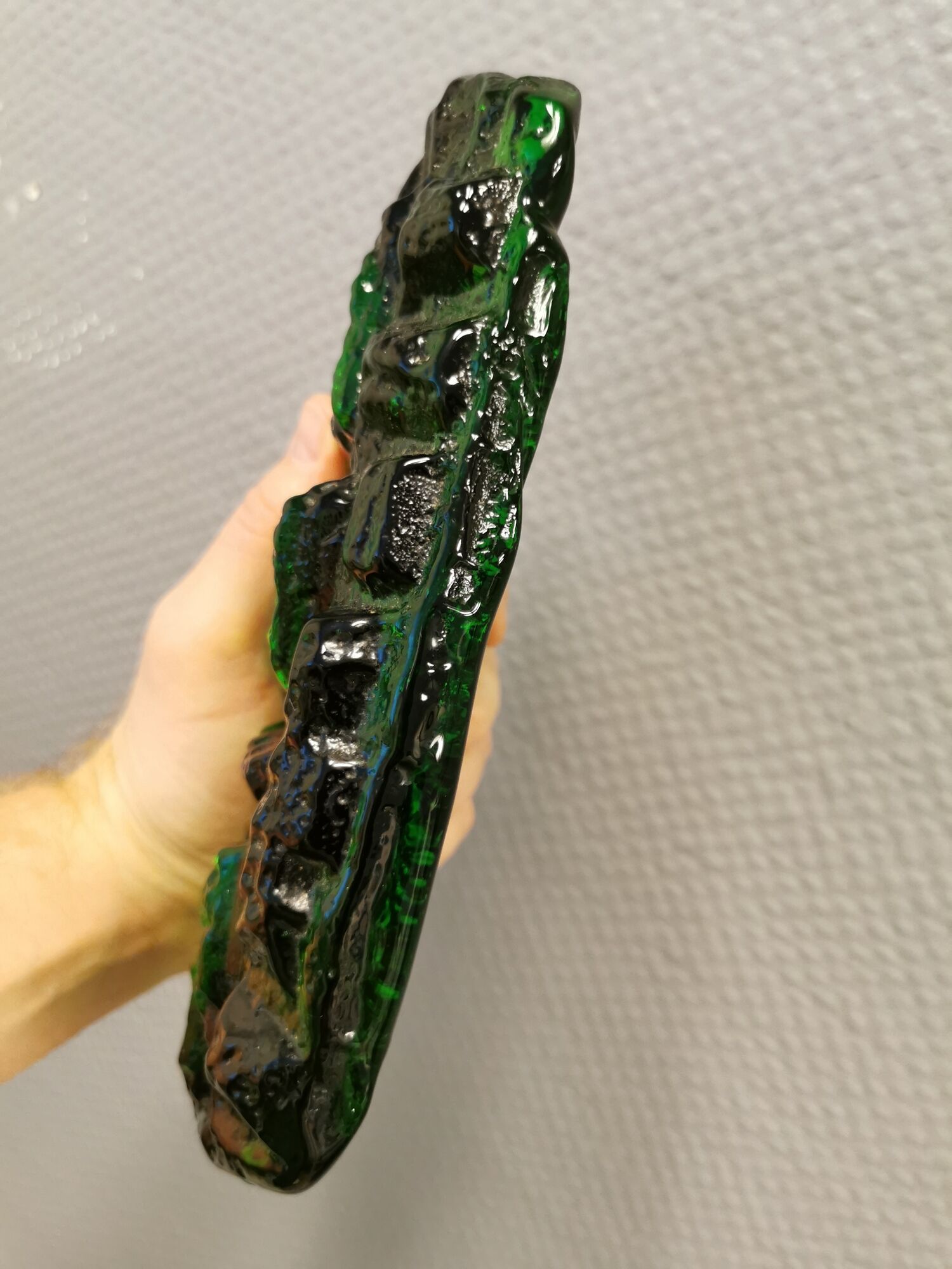 Old wall lamp made of hard pressed green glass.
