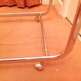 Coffee table with wheels and its two shelves give a smoked